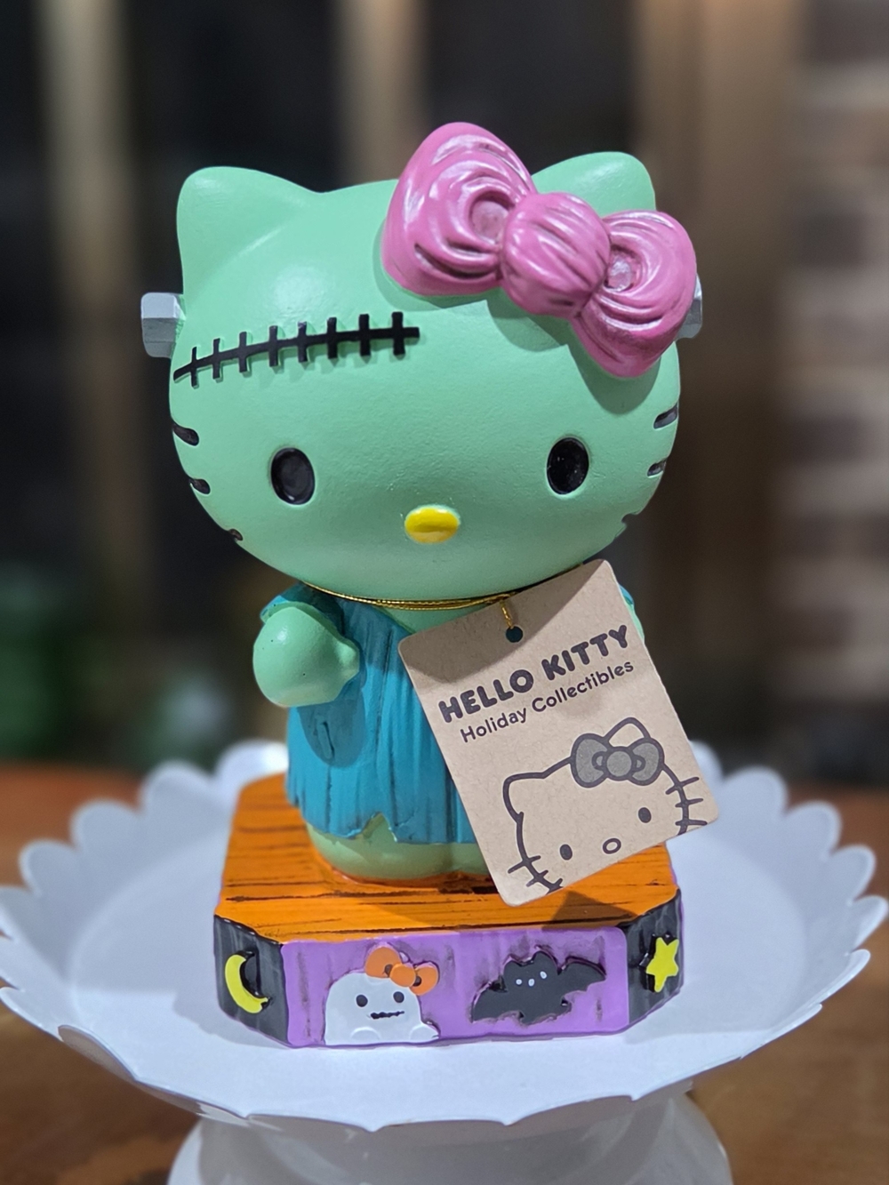 Hello Kitty Green & Pink Holiday Figurine by Sanrio